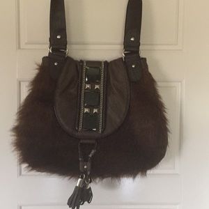 Brown fur and leather purse